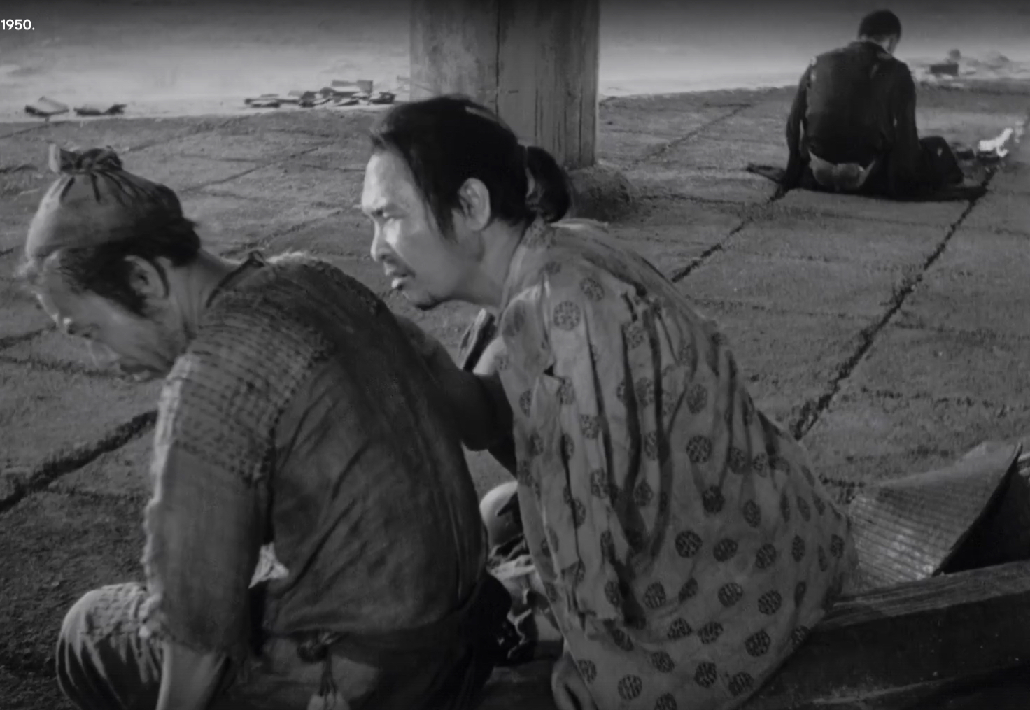 Three men discussing