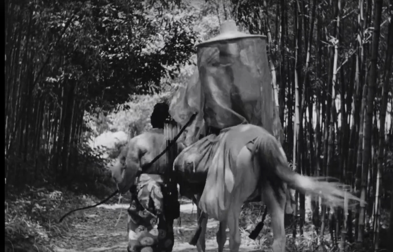 Samurai and wife on forest path